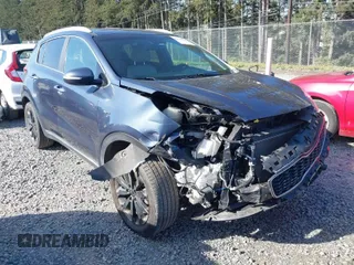 2019 Kia Sportage EX with VIN KNDPNCAC7K7615908, listed as a IAAI auction lot 42004220 with 86,654 mi miles. Bid and sale history available at carsss.com. Image 1.