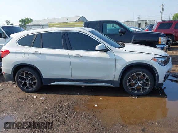 2021 BMW X1 xDrive28i with VIN WBXJG9C02M3M42379, listed as a IAAI auction lot 42476221 with 60,412 mi miles and . Bid and sale history available at DreamBid. Image 14.
