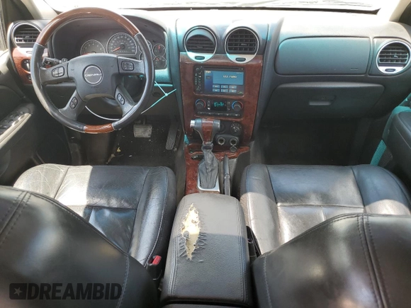 2006 GMC Envoy Denali with VIN 1GKET63M662285870, listed as a Copart auction lot 59828134 with 262,804 mi miles and Salvage Title. Bid and sale history available at DreamBid. Image 8.
