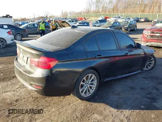 2018 BMW 3 Series 320i xDrive with VIN WBA8E5G57JNU47770, listed as a IAAI auction lot 41409122 with 62,198 mi miles. Bid and sale history available at carsss.com. Image 4.