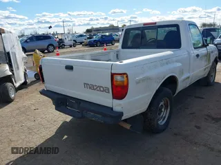 2002 Mazda B-Series 2WD Truck SX with VIN 4F4YR12D42TM18276, listed as a IAAI auction lot 41723184 with 142,623 mi miles. Bid and sale history available at carsss.com. Image 4.