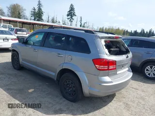 2016 Dodge Journey SE with VIN 3C4PDCAB2GT102871, listed as a IAAI auction lot 42009827 with 197,646 mi miles. Bid and sale history available at carsss.com. Image 3.