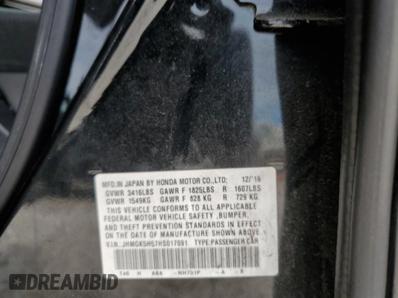 2017 Honda Fit LX z VIN JHMGK5H57HS017091, wystawiony jako Copart lot #55540555 z przebiegiem 98 170 mil mil oraz Szkoda całkowita • Salvage title. Historia ofert i sprzedaży dostępna na DreamBid. Obrazek 12.