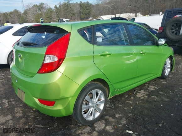 2012 Hyundai Accent SE with VIN KMHCU5AE2CU026701, listed as a IAAI auction lot 41303728 with 66,855 mi miles. Bid and sale history available at carsss.com. Image 4.