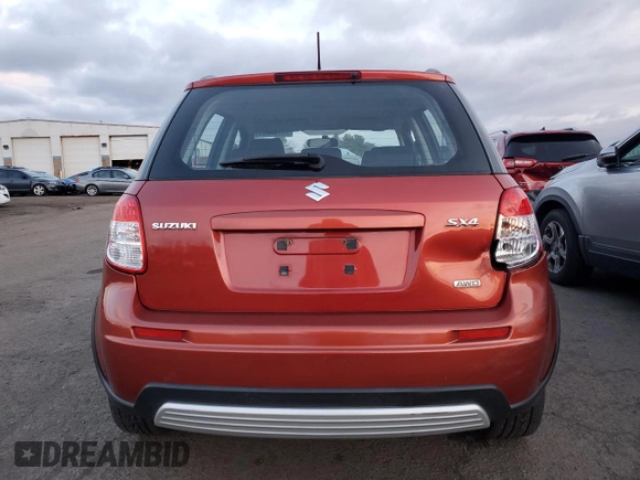 2009 Suzuki SX4 Man AWD with VIN JS2YB413696201043, listed as a Copart auction lot 86283064 with 153,286 mi miles and Salvage Title. Bid and sale history available at carsss.com. Image 6.