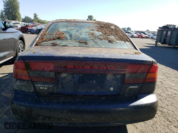 2000 Subaru Legacy L with VIN 4S3BE6353Y7216836, listed as a Copart auction lot 77437624 with Not provided miles and Salvage title. Bid and sale history available at DreamBid. Image 6.