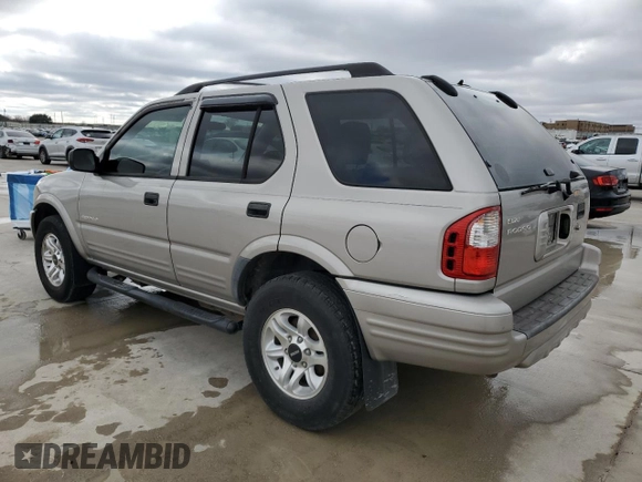 2004 Isuzu Rodeo S with VIN 4S2CK58W344311048, listed as a Copart auction lot 45154765 with 128,733 mi miles and Clean Title. Bid and sale history available at DreamBid. Image 2.