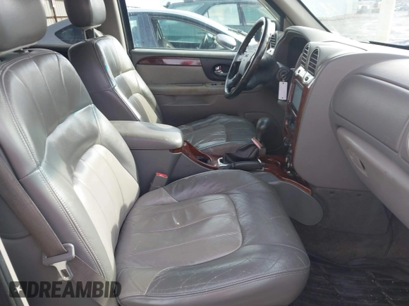 2003 GMC Envoy SLT with VIN 1GKDT13SX32161898, listed as a IAAI auction lot 41642072 with 230,154 mi miles. Bid and sale history available at carsss.com. Image 5.