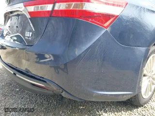 2014 Toyota Avalon Hybrid Limited with VIN 4T1BD1EB5EU024433, listed as a IAAI auction lot 41942865 with 142,377 mi miles. Bid and sale history available at carsss.com. Image 20.