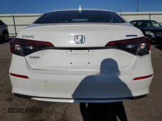 2024 Honda Civic Touring z VIN 2HGFE1F94RH313375, wystawiony jako Copart lot #54844905 z przebiegiem Nie podano mil oraz Szkoda całkowita • Salvage title. Historia ofert i sprzedaży dostępna na DreamBid. Obrazek 6.