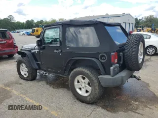 2009 Jeep Wrangler X with VIN 1J4FA24199L783458, listed as a Copart auction lot 56542705 with 236,840 mi miles and Salvage title. Bid and sale history available at DreamBid. Image 2.