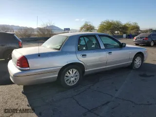 2005 Ford Crown Victoria LX with VIN 2FAFP74W75X165930, listed as a Copart auction lot 81641294 with 138,521 mi miles and Clean Title. Bid and sale history available at carsss.com. Image 3.