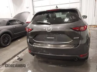 2017 Mazda CX-5 Grand Touring with VIN JM3KFADLXH0151593, listed as a IAAI auction lot 41823378 with 149,299 mi miles. Bid and sale history available at carsss.com. Image 16.