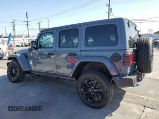 2024 Jeep Wrangler Sahara z VIN 1C4RJXP62RW228549, wystawiony jako Copart lot #57480235 z przebiegiem 6 036 mil mil oraz Szkoda całkowita • Salvage title. Historia ofert i sprzedaży dostępna na DreamBid. Obrazek 2.