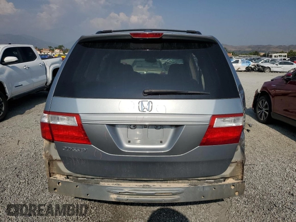 2006 Honda Odyssey EX-L z VIN 5FNRL38756B087695, wystawiony jako Copart lot #60122525 z przebiegiem 213 221 mil mil oraz Szkoda całkowita • Salvage title. Historia ofert i sprzedaży dostępna na DreamBid. Obrazek 6.