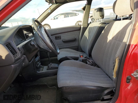 1990 Toyota Corolla z VIN 1NXAE94A6LZ127972, wystawiony jako Copart lot #80673204 z przebiegiem 186 993 mil mil oraz Szkoda całkowita • Salvage title. Historia ofert i sprzedaży dostępna na DreamBid. Obrazek 7.
