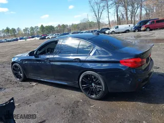 2020 BMW M5 with VIN WBSJF0C05LCE51499, listed as a IAAI auction lot 41982940 with 47,076 mi miles. Bid and sale history available at carsss.com. Image 14.
