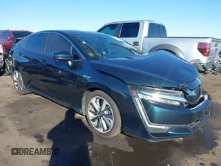 2019 Honda Clarity Plug-In Hybrid with VIN JHMZC5F17KC002257, listed as a IAAI auction lot 41336196 with 51,127 mi miles. Bid and sale history available at carsss.com. Image 1.