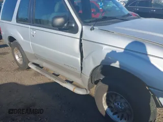 2001 Ford Explorer Sport z VIN 1FMYU60E51UC10105, wystawiony jako IAAI lot #41318866 z przebiegiem 87 218 mil mil oraz . Historia ofert i sprzedaży dostępna na DreamBid. Obrazek 13.