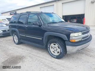 2004 Chevrolet Tahoe LT with VIN 1GNEC13Z74J314927, listed as a IAAI auction lot 41231288 with 195,809 mi miles. Bid and sale history available at carsss.com. Image 1.