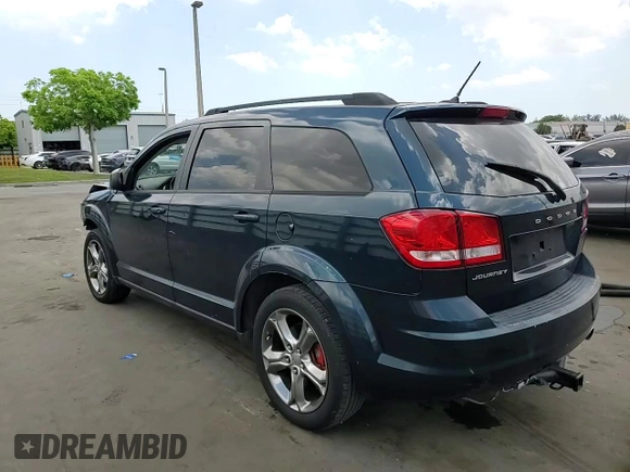 2013 Dodge Journey SE with VIN 3C4PDCAB7DT680055, listed as a Copart auction lot 58241435 with 199,620 mi miles and Salvage title. Bid and sale history available at DreamBid. Image 14.