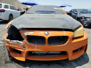 2015 BMW M6 z VIN WBSLX9C56FD160804, wystawiony jako Copart lot #57771054 z przebiegiem 57 699 mil mil oraz Szkody całkowita. Historia ofert i sprzedaży dostępna na DreamBid. Obrazek 5.