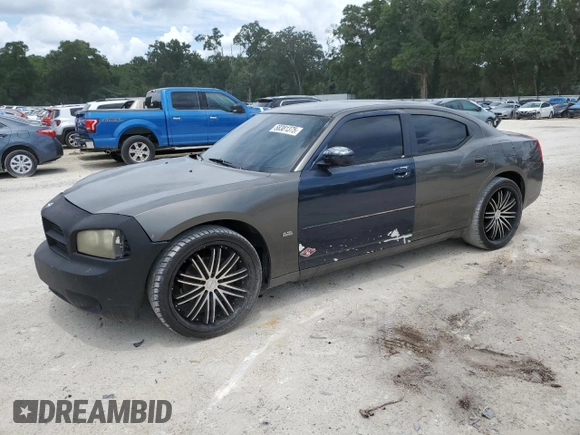 2009 Dodge Charger SE z VIN 2B3KA43DX9H530580, wystawiony jako Copart lot #58381375 z przebiegiem 300 292 mil mil oraz Szkoda całkowita • Salvage title. Historia ofert i sprzedaży dostępna na DreamBid. Obrazek 1.