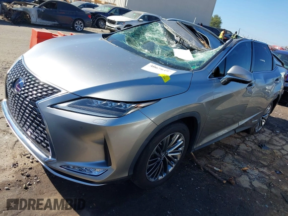 2020 Lexus RX with VIN JTJJGKFA7L2013877, listed as a IAAI auction lot 40678497 with 67,271 mi miles. Bid and sale history available at carsss.com. Image 2.