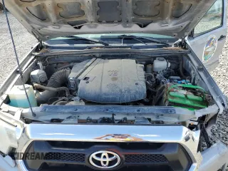 2015 Toyota Tacoma with VIN 3TMLU4EN2FM179631, listed as a Copart auction lot 57769855 with 106,288 mi miles and Salvage title. Bid and sale history available at DreamBid. Image 11.