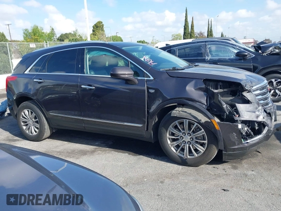 2018 Cadillac XT5 Luxury FWD with VIN 1GYKNCRS4JZ133643, listed as a IAAI auction lot 41916134 with 68,005 mi miles and . Bid and sale history available at carsss.com. Image 13.