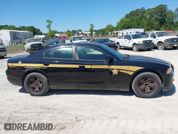 2014 Dodge Charger Police with VIN 2C3CDXAT1EH367015, listed as a IAAI auction lot 42136195 with 121,536 mi miles and . Bid and sale history available at DreamBid. Image 13.