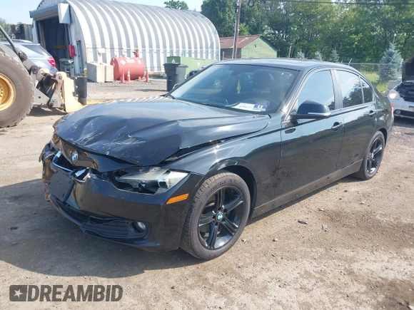 2013 BMW 3 Series 320i xDrive with VIN WBA3C3C50DF981864, listed as a IAAI auction lot 42599429 with 155,150 mi miles and . Bid and sale history available at DreamBid. Image 2.