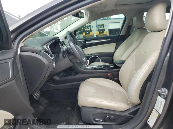 2016 Ford Fusion Titanium with VIN 3FA6P0K90GR180288, listed as a Copart auction lot 60218155 with 140,502 mi miles and Salvage title. Bid and sale history available at DreamBid. Image 7.