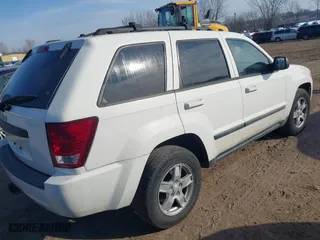 2007 Jeep Grand Cherokee Laredo with VIN 1J8HR48N97C692969, listed as a IAAI auction lot 41798961 with 167,432 mi miles. Bid and sale history available at carsss.com. Image 4.