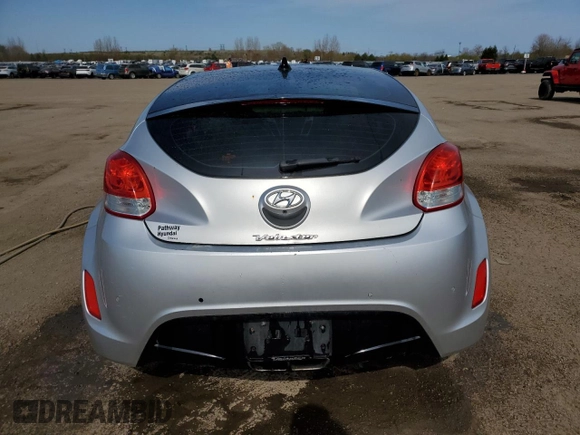 2013 Hyundai Veloster w/Black Int с VIN KMHTC6AD4DU139261, выставлен на аукционе Copart как лот 56175095 с пробегом 148 483 миль миль и Чистый • Clean title. История ставок и продаж доступна на DreamBid. Изображение 6.
