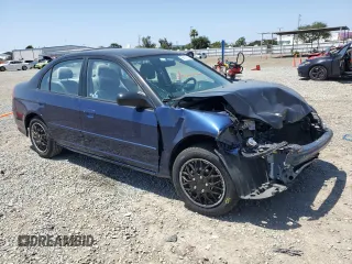 2004 Honda Civic LX with VIN 2HGES165X4H511954, listed as a Copart auction lot 56161185 with 184,496 mi miles and Salvage Title. Bid and sale history available at DreamBid. Image 4.