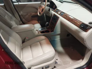 2005 Ford Five Hundred Limited with VIN 1FAFP28195G107776, listed as a IAAI auction lot 41950026 with 114,838 mi miles. Bid and sale history available at carsss.com. Image 5.