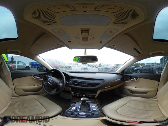 2012 Audi A7 Premium Plus with VIN WAUYGAFC6CN126289, listed as a IAAI auction lot 41945024 with 126,465 mi miles and . Bid and sale history available at DreamBid. Image 18.