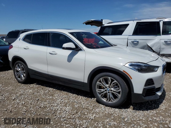 2022 BMW X2 xDrive28i z VIN WBXYJ1C00N5U17584, wystawiony jako Copart lot #55994955 z przebiegiem 21 973 mil mil oraz Czysty tytuł • Clean title. Historia ofert i sprzedaży dostępna na DreamBid. Obrazek 4.