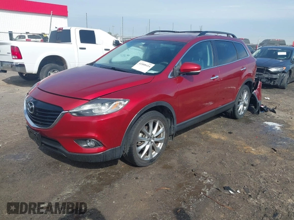 2015 Mazda CX-9 Grand Touring with VIN JM3TB3DA7F0448943, listed as a IAAI auction lot 41888414 with 104,052 mi miles. Bid and sale history available at carsss.com. Image 20.