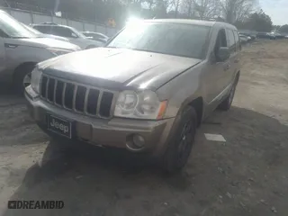 2005 Jeep Grand Cherokee Laredo with VIN 1J4HS48N95C677083, listed as a IAAI auction lot 41452025 with 236,773 mi miles. Bid and sale history available at carsss.com. Image 2.