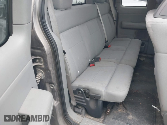 2006 Ford F-150 STX with VIN 1FTRX02WX6KB71470, listed as a IAAI auction lot 41402316 with 168,323 mi miles and . Bid and sale history available at DreamBid. Image 8.
