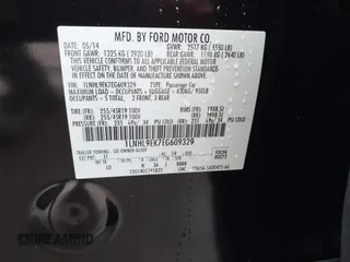 2014 Lincoln MKS with VIN 1LNHL9EK7EG609329, listed as a IAAI auction lot 41555819 with 89,849 mi miles. Bid and sale history available at carsss.com. Image 9.