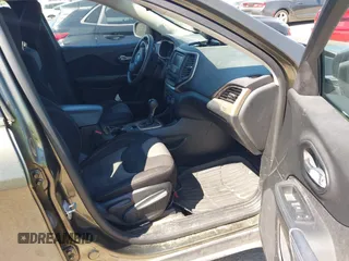 2015 Jeep Cherokee Sport z VIN 1C4PJLAB6FW722642, wystawiony jako IAAI lot #42742619 z przebiegiem 147 517 mil mil oraz . Historia ofert i sprzedaży dostępna na DreamBid. Obrazek 5.