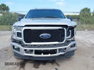 2019 Ford F-150 XL with VIN 1FTEW1E55KKC58276, listed as a IAAI auction lot 42133235 with 97,032 mi miles. Bid and sale history available at carsss.com. Image 12.