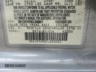 2012 Nissan Versa SV with VIN 3N1CN7AP8CL850021, listed as a Copart auction lot 60979605 with 238,261 mi miles and Salvage title. Bid and sale history available at DreamBid. Image 13.