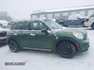 2015 MINI Countryman S z VIN WMWZC5C59FWP48946, wystawiony jako IAAI lot #41298127 z przebiegiem 106 293 mil mil oraz . Historia ofert i sprzedaży dostępna na DreamBid. Obrazek 13.