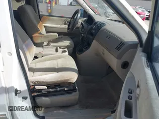 2005 Kia Sedona LX with VIN KNDUP131456634276, listed as a IAAI auction lot 42090209 with 185,754 mi miles and . Bid and sale history available at DreamBid. Image 5.