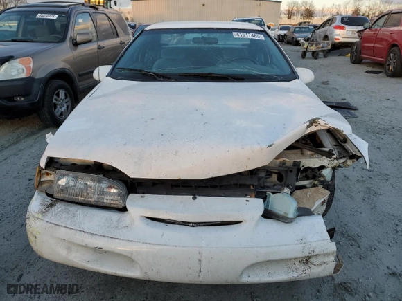 1995 Ford Thunderbird LX with VIN 1FALP62W3SH119037, listed as a Copart auction lot 41517485 with 164,133 mi miles and Salvage Title. Bid and sale history available at carsss.com. Image 5.