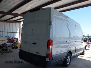 2022 Ford Transit Cargo with VIN 1FTBW3X89NKA69141, listed as a IAAI auction lot 41980864 with 102,721 mi miles and . Bid and sale history available at DreamBid. Image 4.